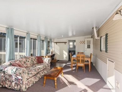 Welcome to this charming 1-bedroom, 2-bathroom seasonal cottage on Apple Island Golf Course At Apple Island Resort in Vermont - for sale on GolfHomes.com, golf home, golf lot