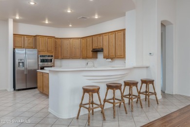 Single-level townhome, backing to open space, green belt, and on Canyon Mesa Country Club in Arizona - for sale on GolfHomes.com, golf home, golf lot
