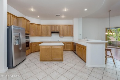 Single-level townhome, backing to open space, green belt, and on Canyon Mesa Country Club in Arizona - for sale on GolfHomes.com, golf home, golf lot