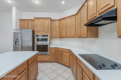 Single-level townhome, backing to open space, green belt, and on Canyon Mesa Country Club in Arizona - for sale on GolfHomes.com, golf home, golf lot