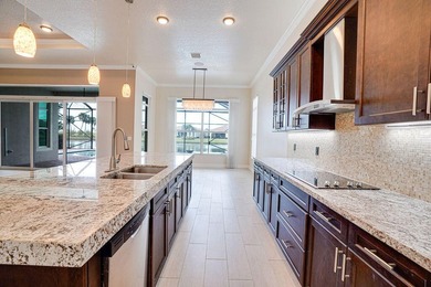 Stunning PGA Verano Pool Home with expansive water views. The on PGA Golf Club in PGA Village in Florida - for sale on GolfHomes.com, golf home, golf lot