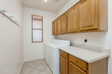 Single-level townhome, backing to open space, green belt, and on Canyon Mesa Country Club in Arizona - for sale on GolfHomes.com, golf home, golf lot