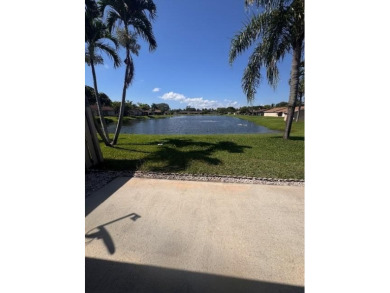 EXPERIENCE LAKEFRONT VIEWS AT THEIR BEST IN THIS impeccable on High Ridge Country Club in Florida - for sale on GolfHomes.com, golf home, golf lot