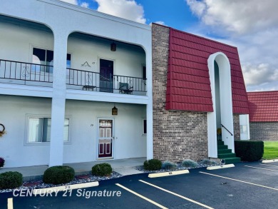 Enjoy easy living in this 2-bedroom, 2-full-bath condo perfectly on Swan Valley Golf Club in Michigan - for sale on GolfHomes.com, golf home, golf lot