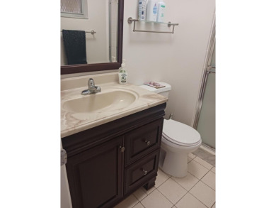 Fall in love with this 2Br/2Ba corner villa is ideally located on Leisureville Community Golf Course in Florida - for sale on GolfHomes.com, golf home, golf lot