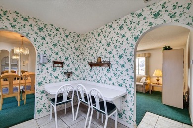 WONDERFUL 2-bedroom, 2-bath home featuring a 17'x10' ENCLOSED on The Links of Spruce Creek in Florida - for sale on GolfHomes.com, golf home, golf lot