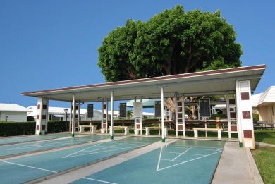 Fall in love with this 2Br/2Ba corner villa is ideally located on Leisureville Community Golf Course in Florida - for sale on GolfHomes.com, golf home, golf lot