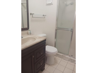 Fall in love with this 2Br/2Ba corner villa is ideally located on Leisureville Community Golf Course in Florida - for sale on GolfHomes.com, golf home, golf lot