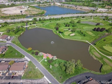 Incredible end unit ranch overlooking the pond and pier in this on St. Clair Shores Country Club in Michigan - for sale on GolfHomes.com, golf home, golf lot