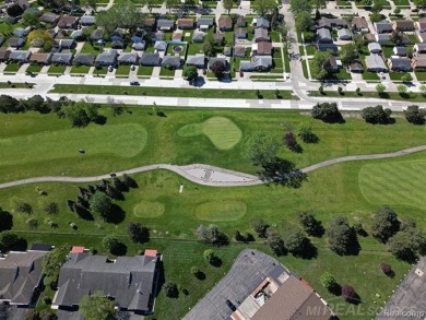 Incredible end unit ranch overlooking the pond and pier in this on St. Clair Shores Country Club in Michigan - for sale on GolfHomes.com, golf home, golf lot