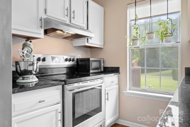Charming 2BR/1.5 condo in sought after South Charlotte on Raintree Country Club in North Carolina - for sale on GolfHomes.com, golf home, golf lot