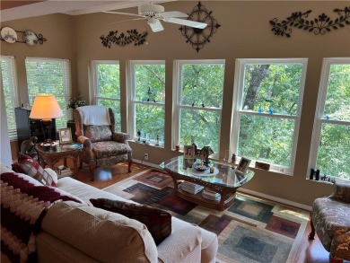 Updated, lake adjacent and only $143 a sq. ft! Perfect, move-in on Bella Vista Country Club - Berksdale in Arkansas - for sale on GolfHomes.com, golf home, golf lot