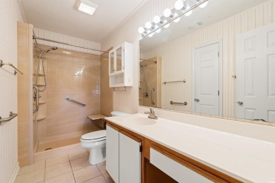 This great first floor end unit, with a large screened in back on Palmetto Greens Golf and Country Club in South Carolina - for sale on GolfHomes.com, golf home, golf lot