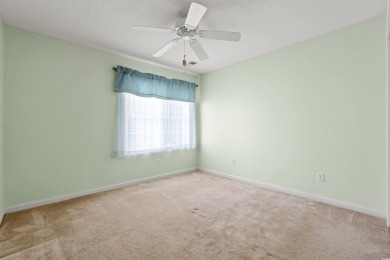 This great first floor end unit, with a large screened in back on Palmetto Greens Golf and Country Club in South Carolina - for sale on GolfHomes.com, golf home, golf lot