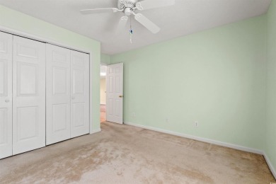 This great first floor end unit, with a large screened in back on Palmetto Greens Golf and Country Club in South Carolina - for sale on GolfHomes.com, golf home, golf lot