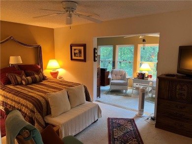 Updated, lake adjacent and only $143 a sq. ft! Perfect, move-in on Bella Vista Country Club - Berksdale in Arkansas - for sale on GolfHomes.com, golf home, golf lot