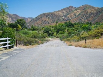 Nearly 13 Acres of private land with utilities at the street on Sand Canyon Country Club in California - for sale on GolfHomes.com, golf home, golf lot