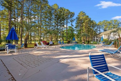 This great first floor end unit, with a large screened in back on Palmetto Greens Golf and Country Club in South Carolina - for sale on GolfHomes.com, golf home, golf lot