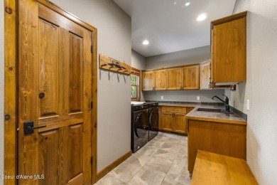 Forest Hills Luxury - Nestled at the end of a quiet cul-de-sac on Hayden Lake Country Club in Idaho - for sale on GolfHomes.com, golf home, golf lot