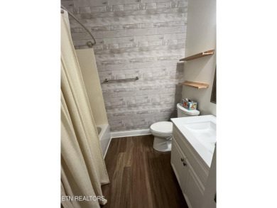 Stunning Bottom-Floor Condo with stunning views in a  Premier on Rarity Bay Country Club - Loudon in Tennessee - for sale on GolfHomes.com, golf home, golf lot