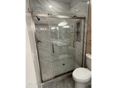 Stunning Bottom-Floor Condo with stunning views in a  Premier on Rarity Bay Country Club - Loudon in Tennessee - for sale on GolfHomes.com, golf home, golf lot