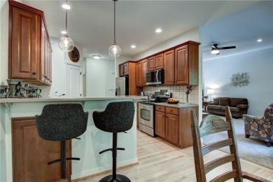 Beautifully maintained home sits on a spacious .69-acre lot on Menomonie Country Club in Wisconsin - for sale on GolfHomes.com, golf home, golf lot