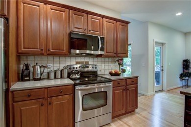 Beautifully maintained home sits on a spacious .69-acre lot on Menomonie Country Club in Wisconsin - for sale on GolfHomes.com, golf home, golf lot
