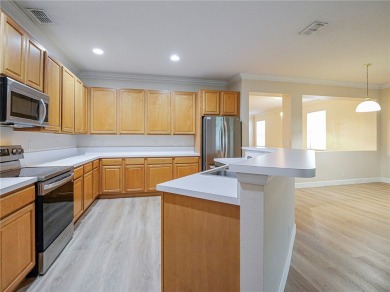 Located in Pointe West's central village, this 3 bedroom 2 bath on The Club At Pointe West in Florida - for sale on GolfHomes.com, golf home, golf lot