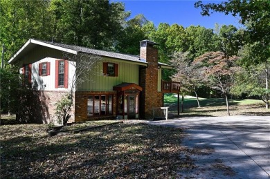 Located on the 17th green of the golf course in the resort-like on Bent Tree Golf Course in Georgia - for sale on GolfHomes.com, golf home, golf lot