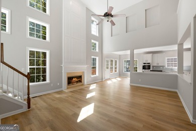Welcome home to this stunning 3-story brick residence in the on Canongate At Heron Bay in Georgia - for sale on GolfHomes.com, golf home, golf lot