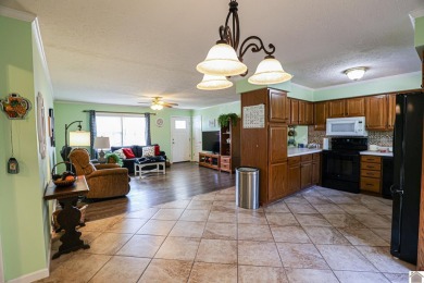 This inviting 3-bedroom, 2-bathroom home offers 1,300+ sqft of on Benton Golf and Country Club in Kentucky - for sale on GolfHomes.com, golf home, golf lot