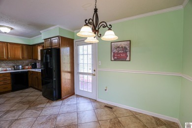 This inviting 3-bedroom, 2-bathroom home offers 1,300+ sqft of on Benton Golf and Country Club in Kentucky - for sale on GolfHomes.com, golf home, golf lot