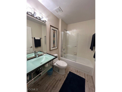 WELCOME TO YOUR NEW HOME with PEACEFUL AND SPECTACULAR LAKE & on Eagle Ridge Golf and Tennis Club in Florida - for sale on GolfHomes.com, golf home, golf lot