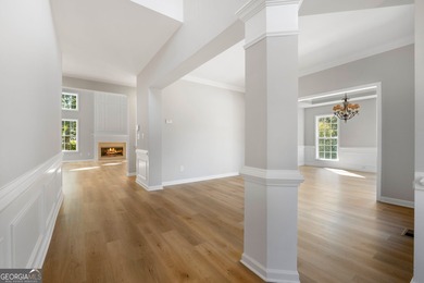 Welcome home to this stunning 3-story brick residence in the on Canongate At Heron Bay in Georgia - for sale on GolfHomes.com, golf home, golf lot