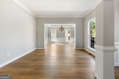 Welcome home to this stunning 3-story brick residence in the on Canongate At Heron Bay in Georgia - for sale on GolfHomes.com, golf home, golf lot