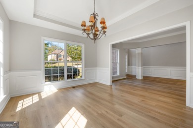 Welcome home to this stunning 3-story brick residence in the on Canongate At Heron Bay in Georgia - for sale on GolfHomes.com, golf home, golf lot