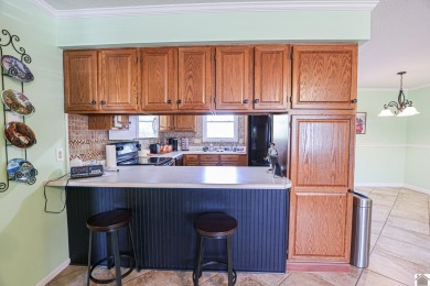 This inviting 3-bedroom, 2-bathroom home offers 1,300+ sqft of on Benton Golf and Country Club in Kentucky - for sale on GolfHomes.com, golf home, golf lot