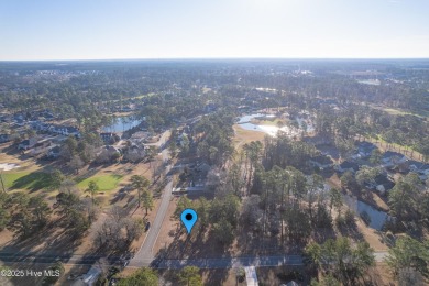 Measuring almost 1/2 acres is this affordable corner lot in on Brunswick Plantation and Golf Resorts in North Carolina - for sale on GolfHomes.com, golf home, golf lot