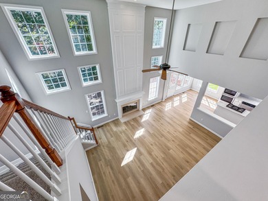 Welcome home to this stunning 3-story brick residence in the on Canongate At Heron Bay in Georgia - for sale on GolfHomes.com, golf home, golf lot