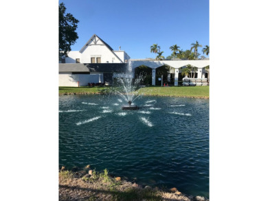 Enjoy breathtaking water views from this top-floor condo in the on Marina Lakes Golf Course in Florida - for sale on GolfHomes.com, golf home, golf lot