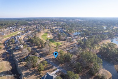 Measuring almost 1/2 acres is this affordable corner lot in on Brunswick Plantation and Golf Resorts in North Carolina - for sale on GolfHomes.com, golf home, golf lot