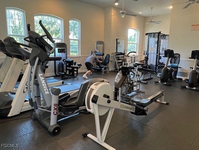 WELCOME TO YOUR NEW HOME with PEACEFUL AND SPECTACULAR LAKE & on Eagle Ridge Golf and Tennis Club in Florida - for sale on GolfHomes.com, golf home, golf lot