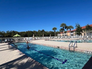 WELCOME TO YOUR NEW HOME with PEACEFUL AND SPECTACULAR LAKE & on Eagle Ridge Golf and Tennis Club in Florida - for sale on GolfHomes.com, golf home, golf lot