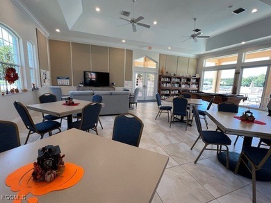 WELCOME TO YOUR NEW HOME with PEACEFUL AND SPECTACULAR LAKE & on Eagle Ridge Golf and Tennis Club in Florida - for sale on GolfHomes.com, golf home, golf lot