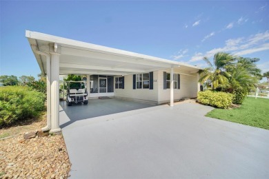 BRING YOUR BOAT! This incredible 2-bedroom 2 bathroom home is on Bay Tree Golf Course in Florida - for sale on GolfHomes.com, golf home, golf lot