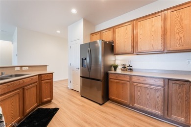 This beautifully maintained home has beautiful views of the golf on Aliante Golf Club in Nevada - for sale on GolfHomes.com, golf home, golf lot