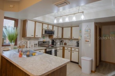 Charming 2-Bed, 2-Bath Fairways Condo Near Golf  Beach -- $199K
 on Palm Harbor Golf Club in Florida - for sale on GolfHomes.com, golf home, golf lot