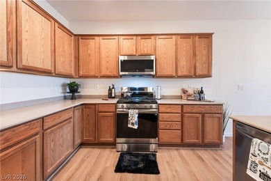 This beautifully maintained home has beautiful views of the golf on Aliante Golf Club in Nevada - for sale on GolfHomes.com, golf home, golf lot