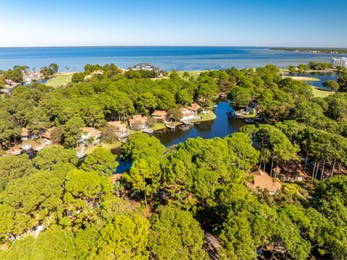 Perfectly positioned along the central lake in the coveted on Sandestin Golf and Beach Resort - The Links in Florida - for sale on GolfHomes.com, golf home, golf lot