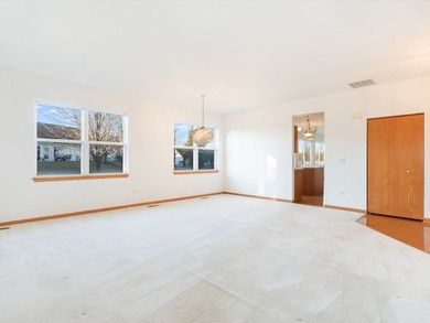 Sprawling ranch townhome with stunning pond views in the sought on The Links at Carillon in Illinois - for sale on GolfHomes.com, golf home, golf lot